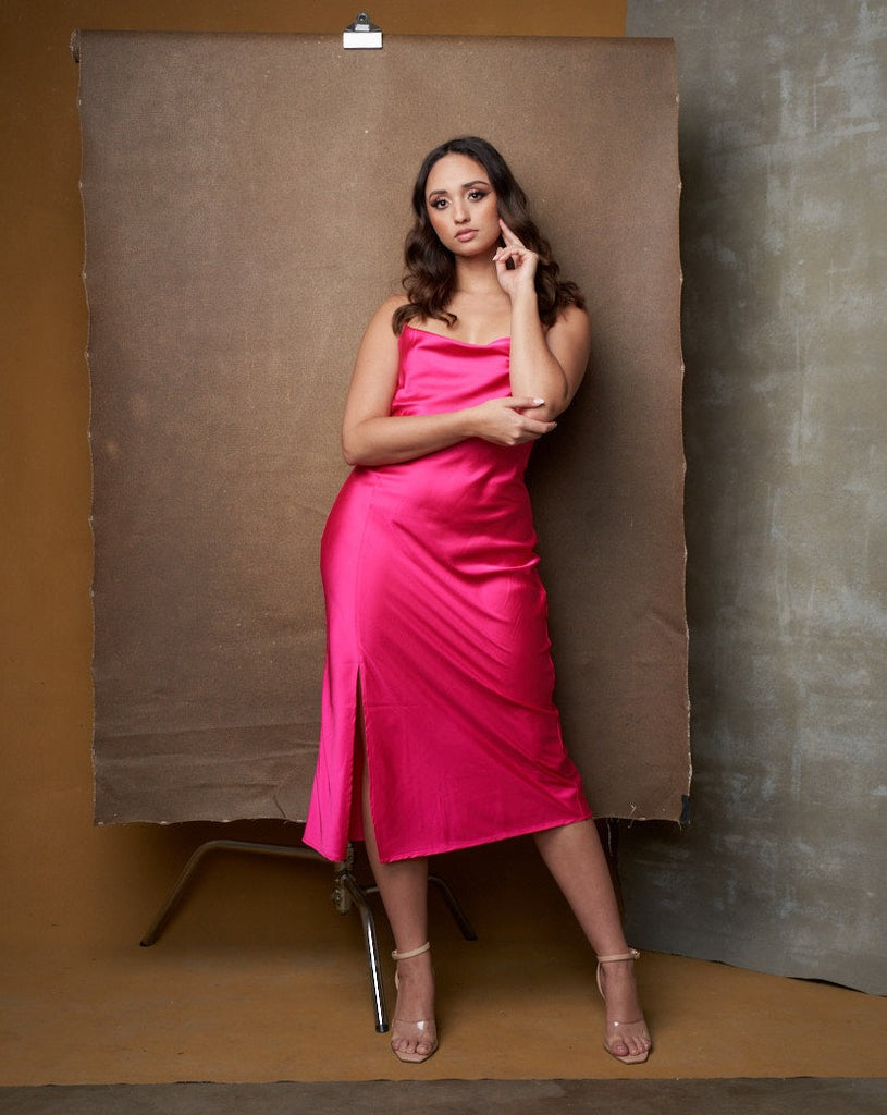 WOMAN IN HOT PINK DRESS