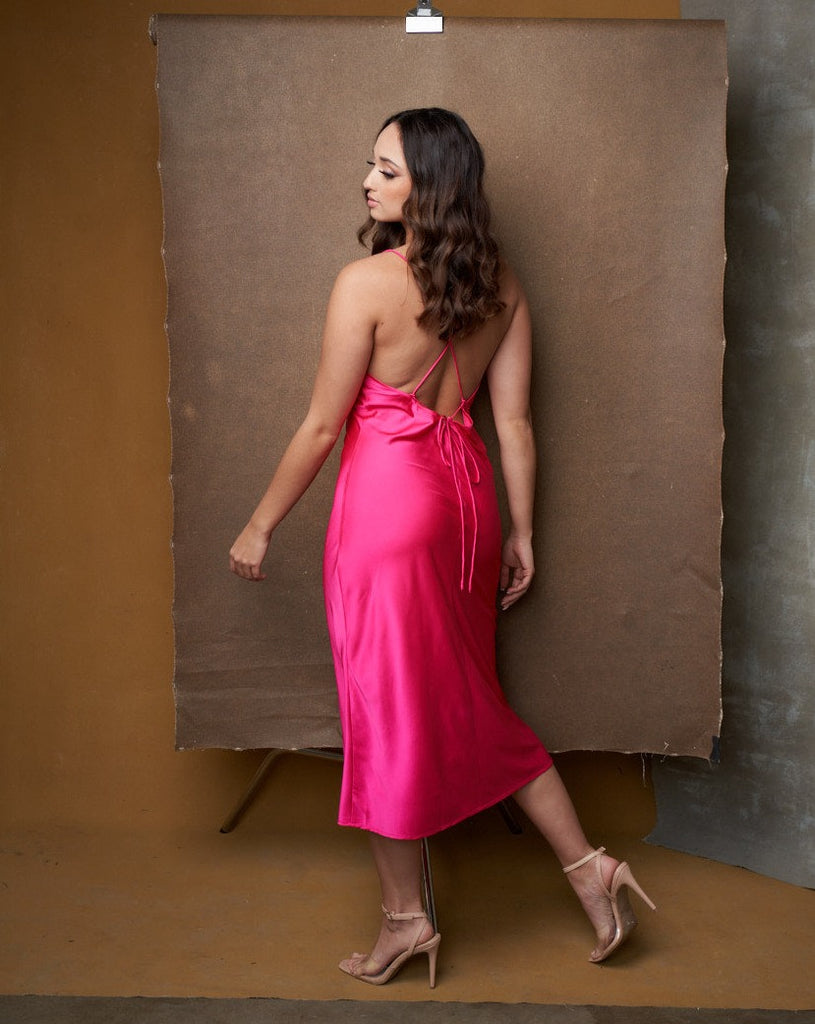 WOMAN IN HOT PINK DRESS